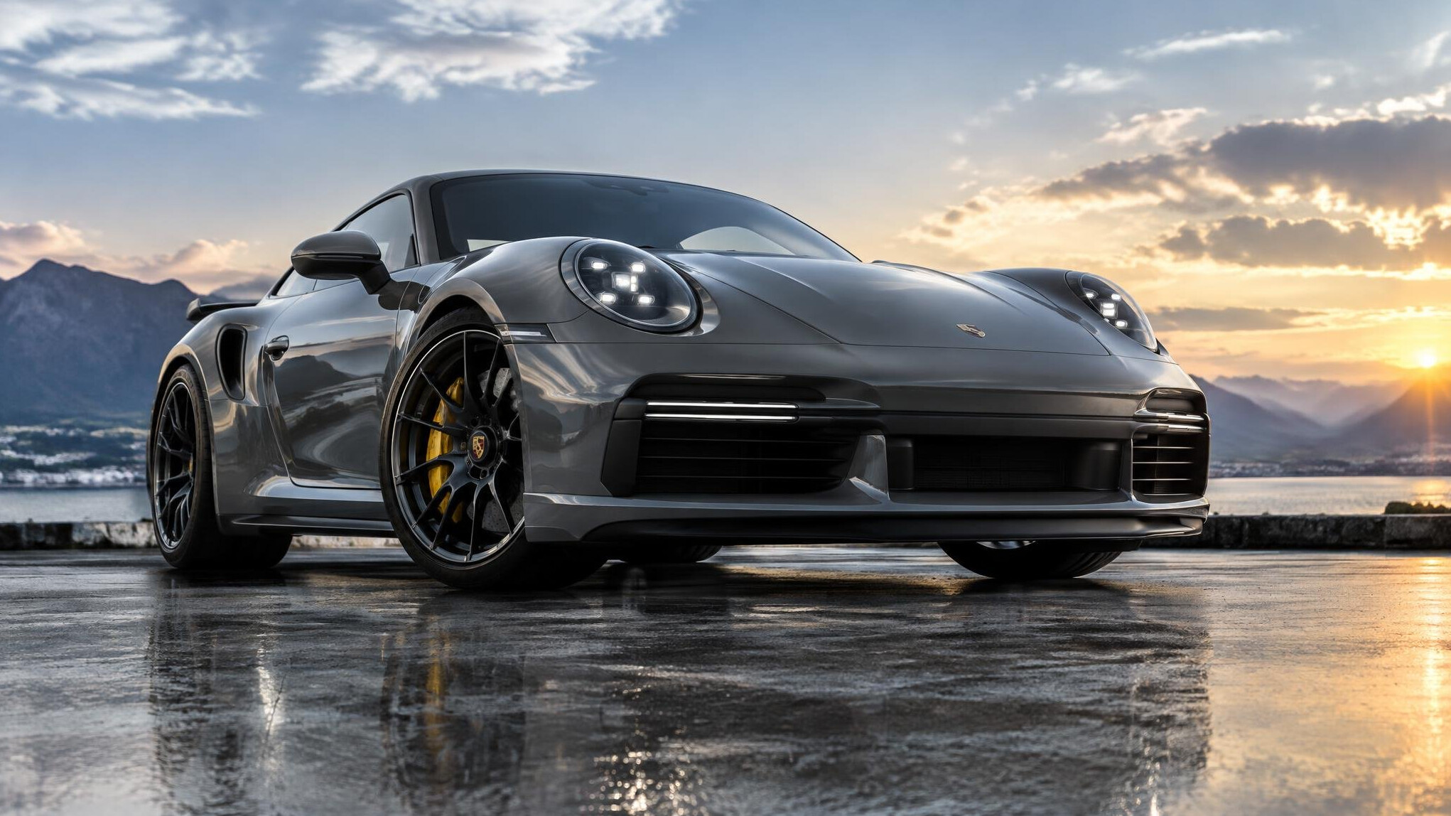 Grey sports car with a deep gloss finish on a road
