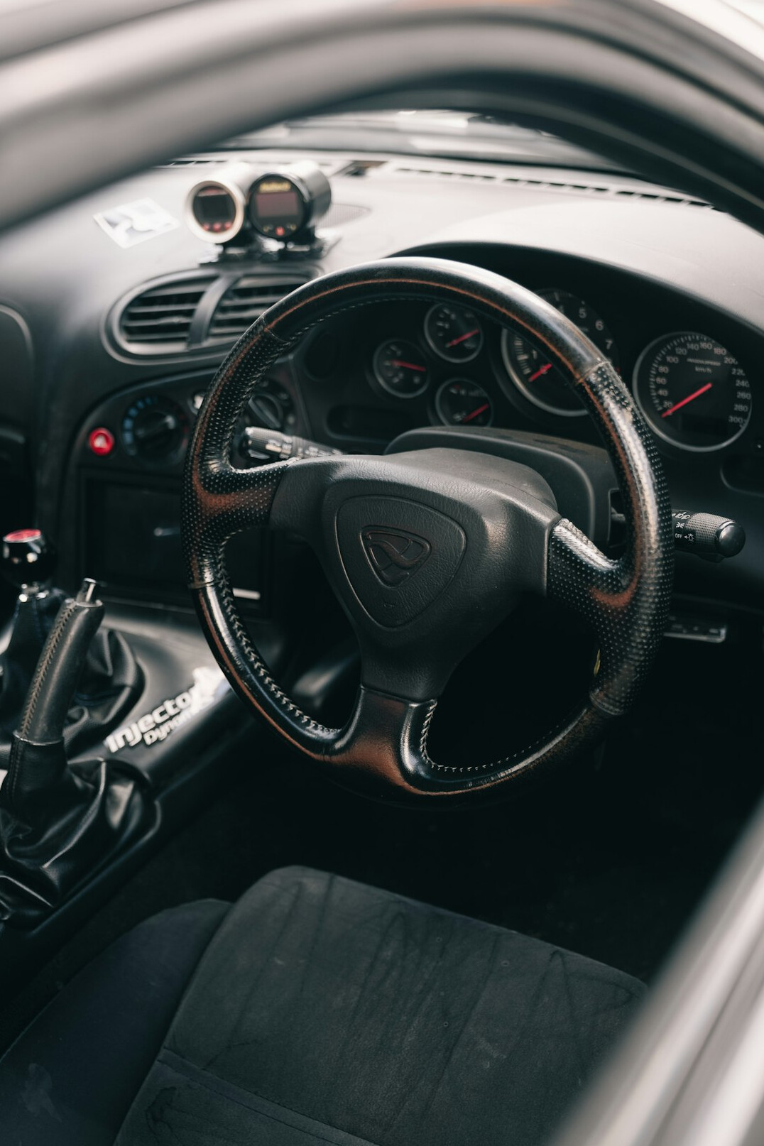 Clean car interior dashboard and steering wheel